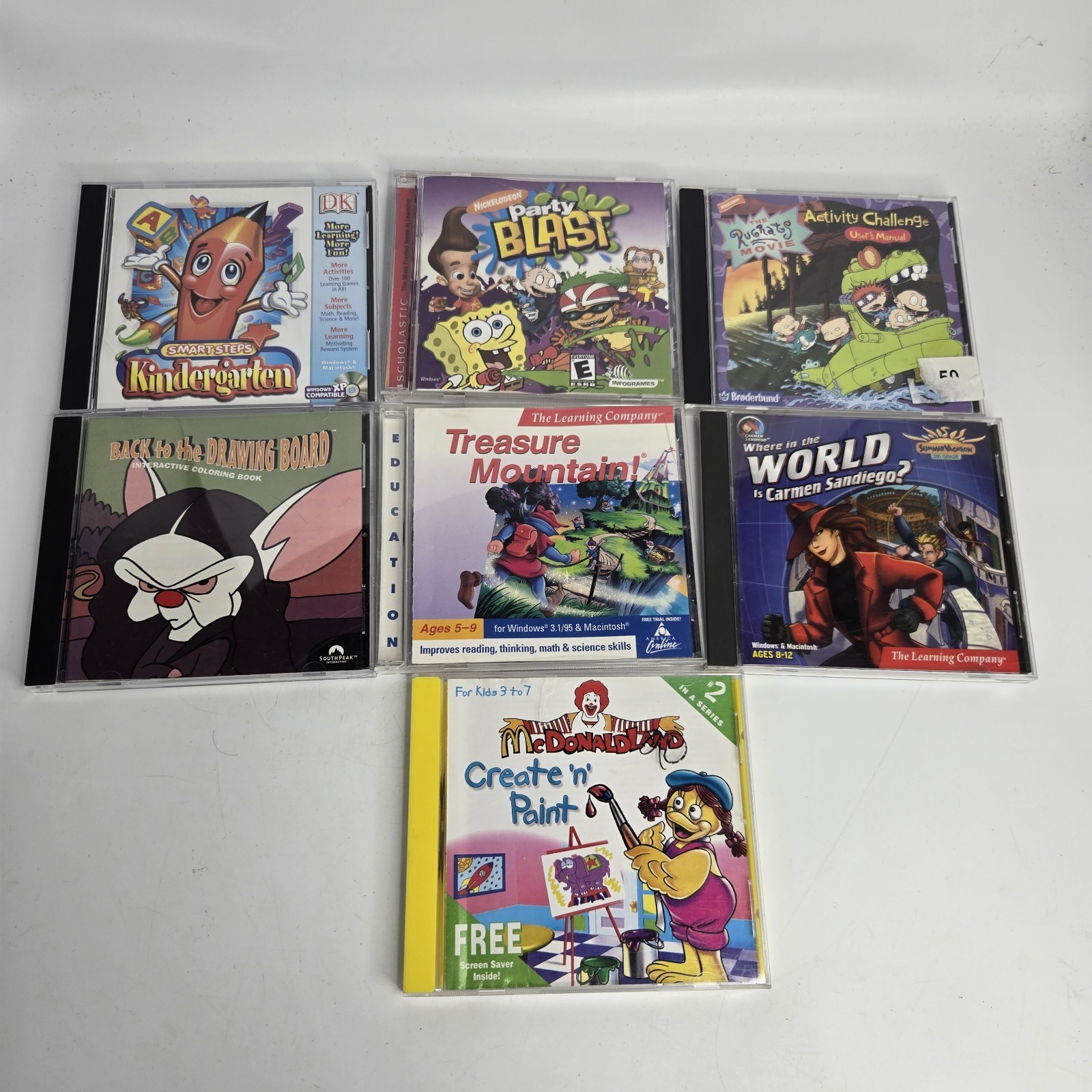 Lot of 7 kids pc computer learning games Nickelodeon McDonalds Carmen Sandiego