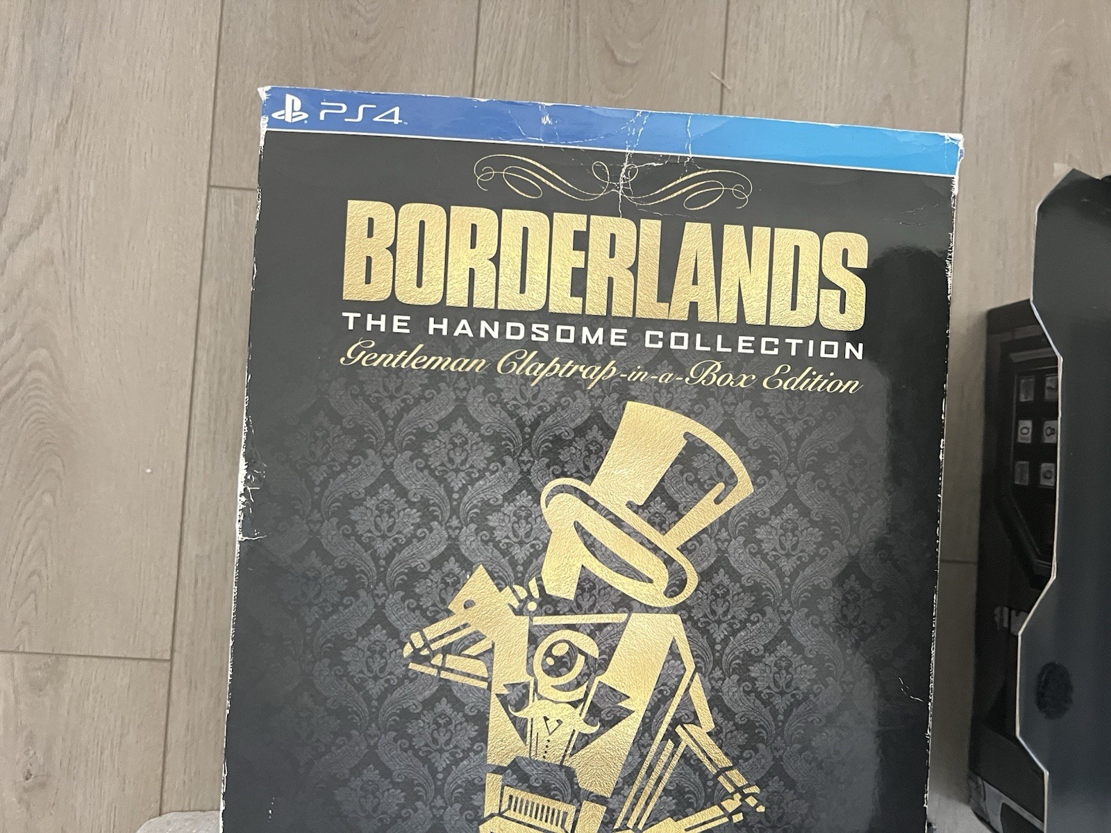 Borderlands: The Handsome Collection- Claptrap-in-a-Box. No game, no steelbook.