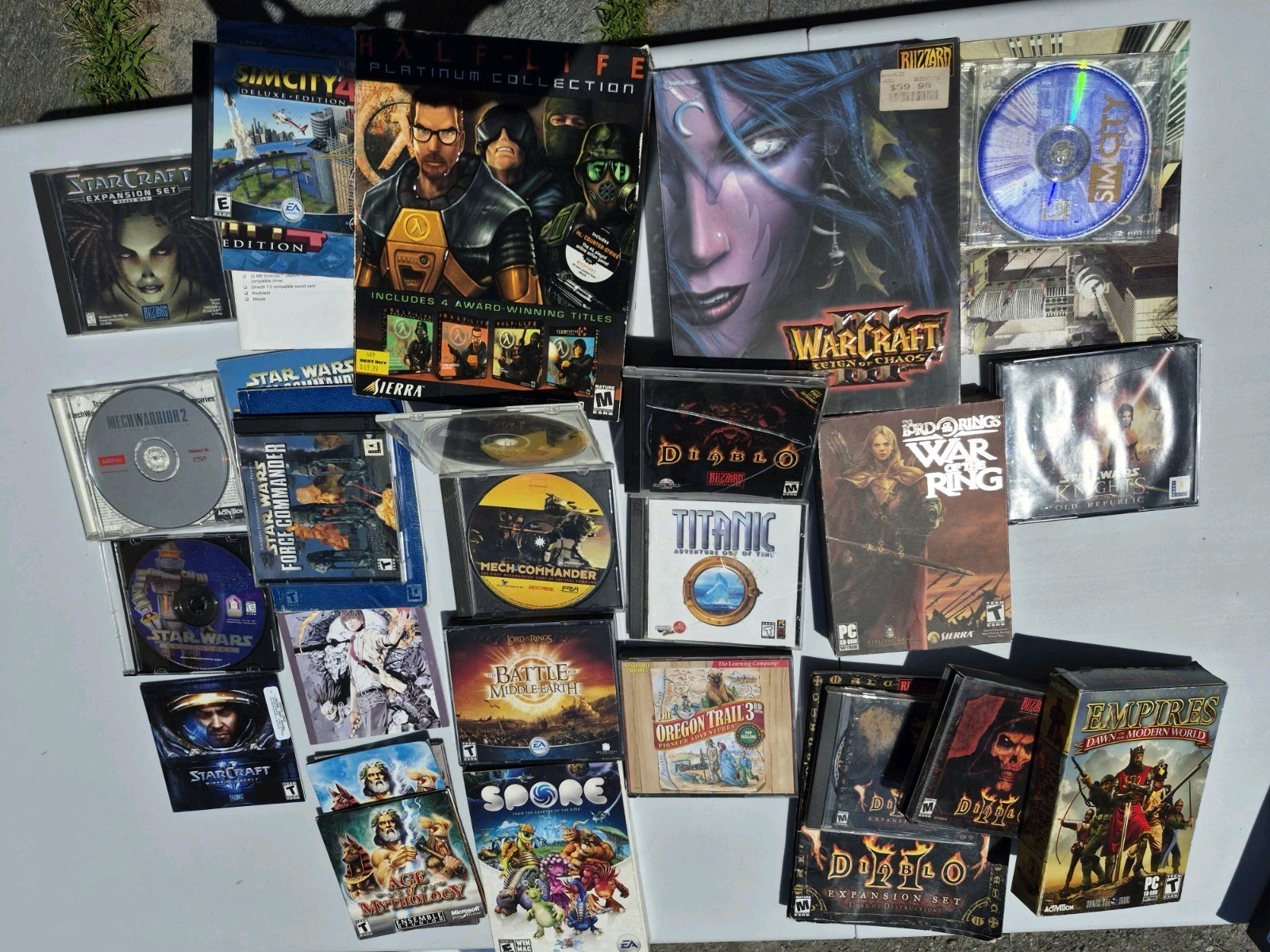 PC games lot inc: Half-Life, Warcraft III, Diablo II, Starcraft and LOTR games