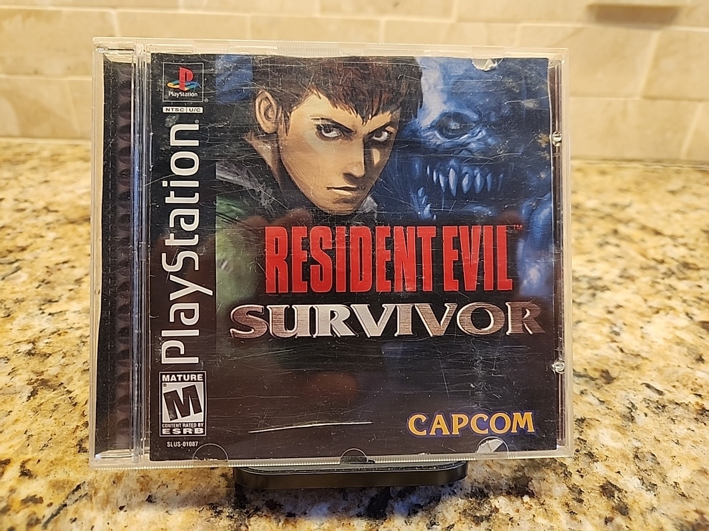 Resident Evil: Survivor (Sony PlayStation 1, 2000) CIB Complete [WATER DAMAGE]