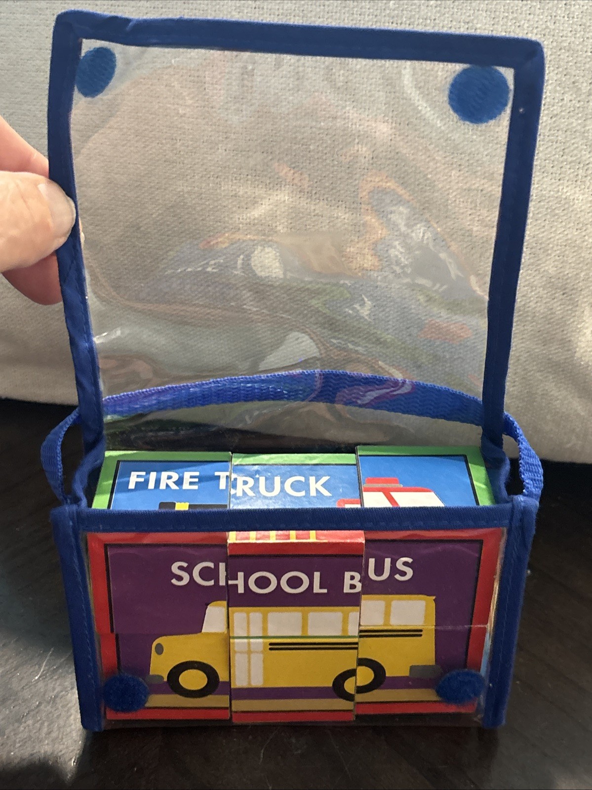 Set of children’s toy blocks packaged in a clear blue carrying case School Bus