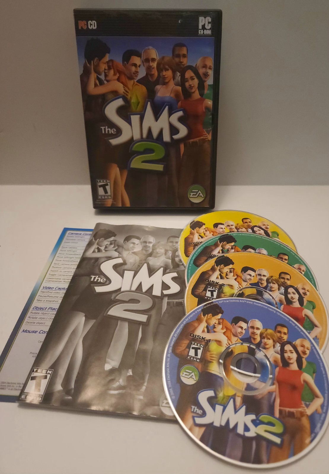 The Sims 2 PC CD-ROM Complete with Case, Manuals, Disc 1-4