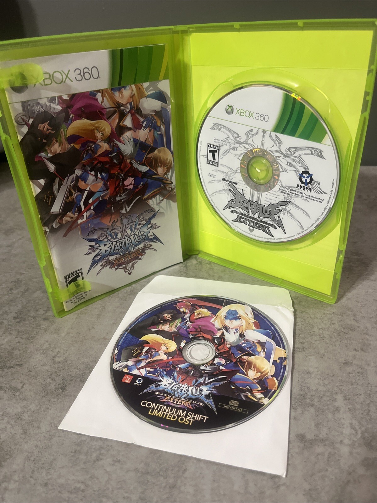 BlazBlue Continuum Shift Extend Xbox 360 – Complete CIB W/ Manual And Song Disc
