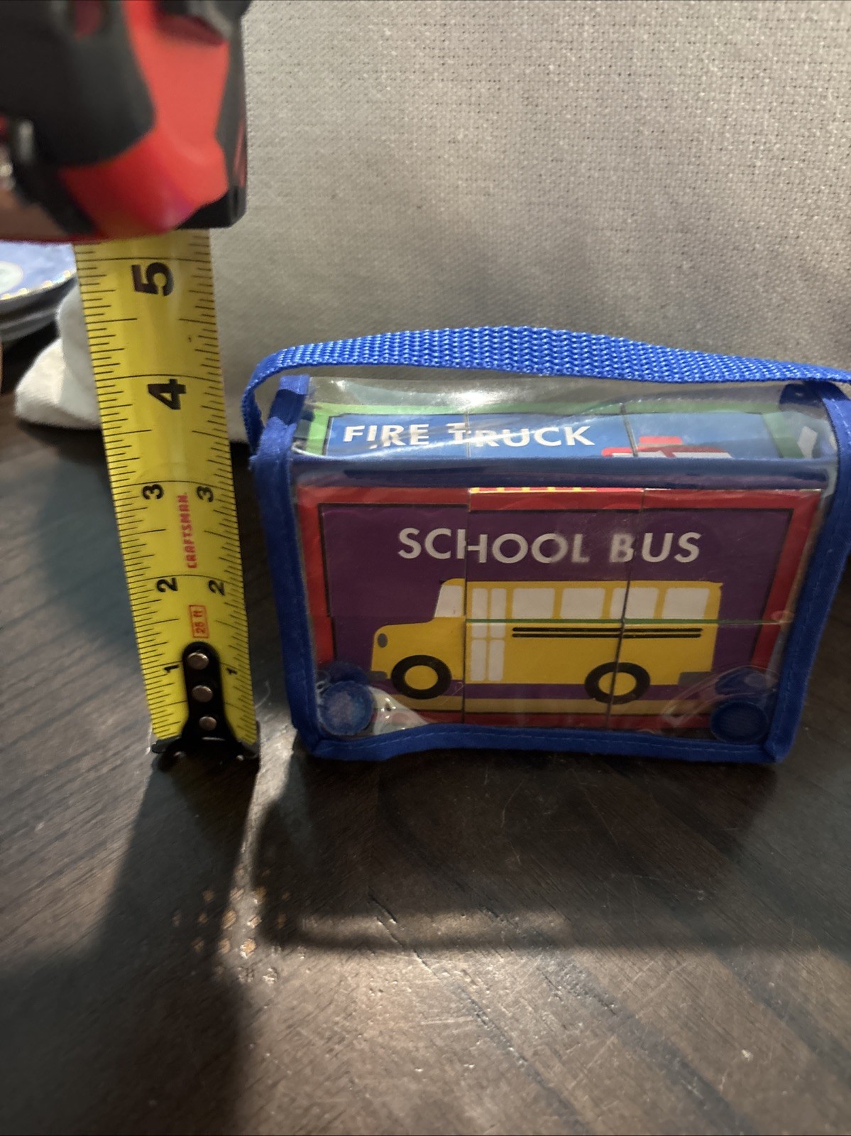 Set of children’s toy blocks packaged in a clear blue carrying case School Bus