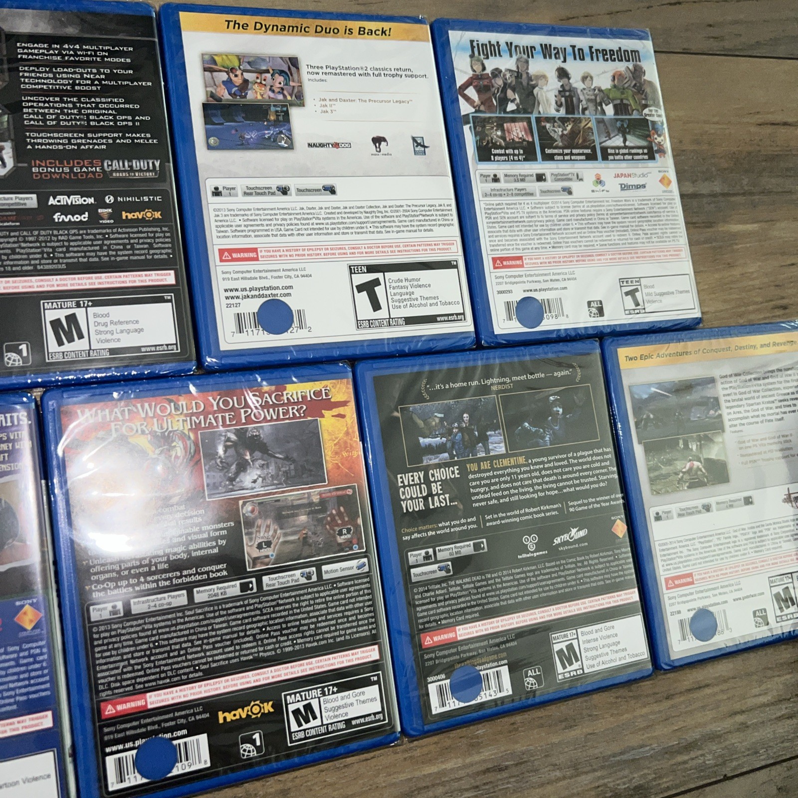 PlayStation Vita Games Lot of 7 ( God of War, Tearaway, Walking Dead, COD, Jak)