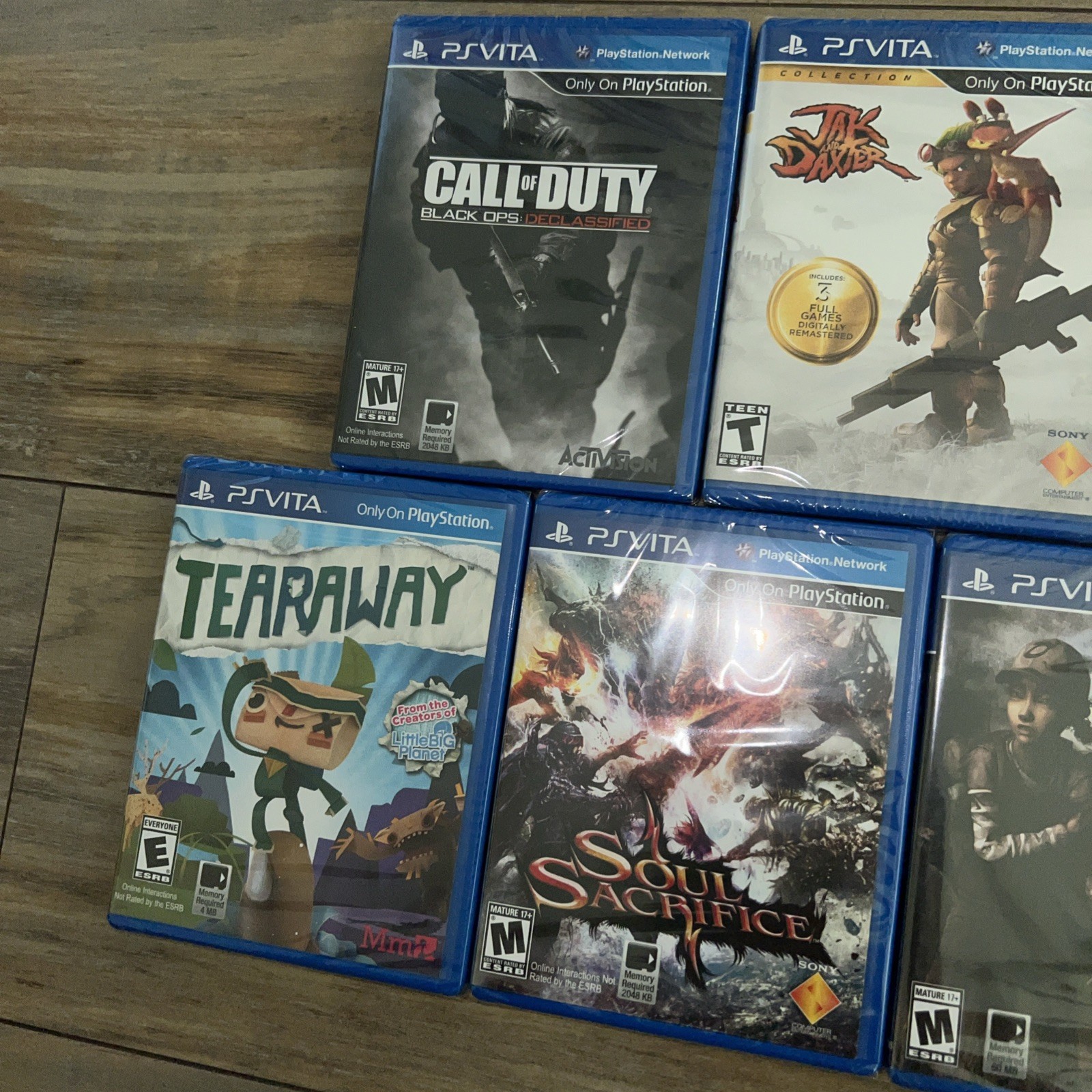 PlayStation Vita Games Lot of 7 ( God of War, Tearaway, Walking Dead, COD, Jak)