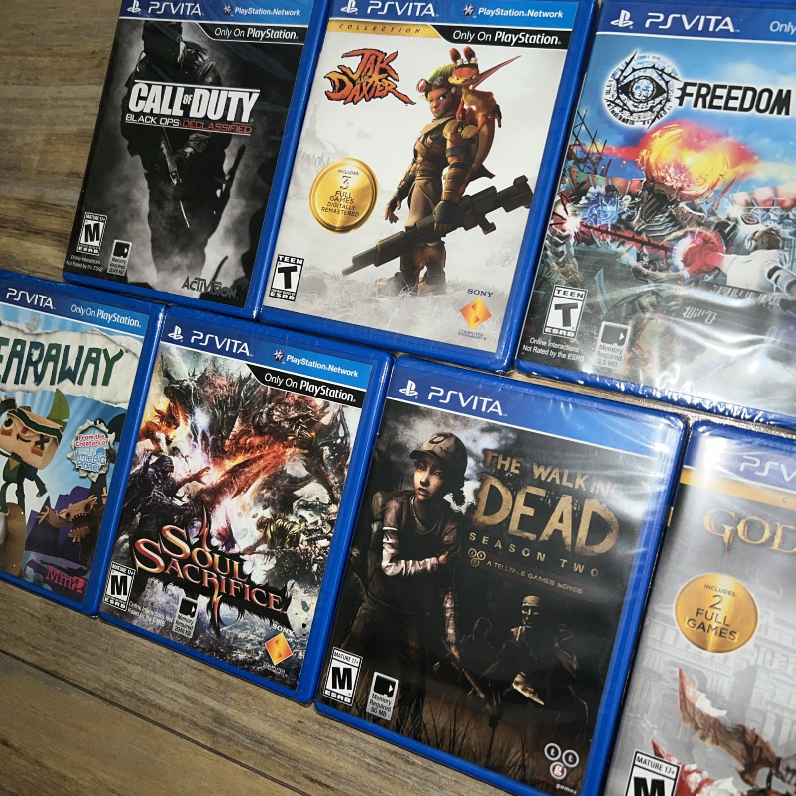 PlayStation Vita Games Lot of 7 ( God of War, Tearaway, Walking Dead, COD, Jak)