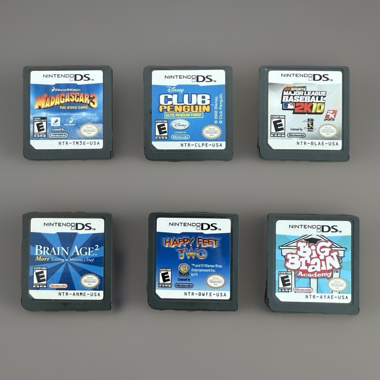 Nintendo DS 7 Game Lot MLB Madagascar Big Brain Age 2 Club Penguin Zoo Tycoon…