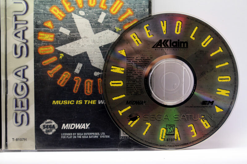REVOLUTION X GAME SEGA SATURN DISC AMERICAN EDITION T-8107H VBC 78217