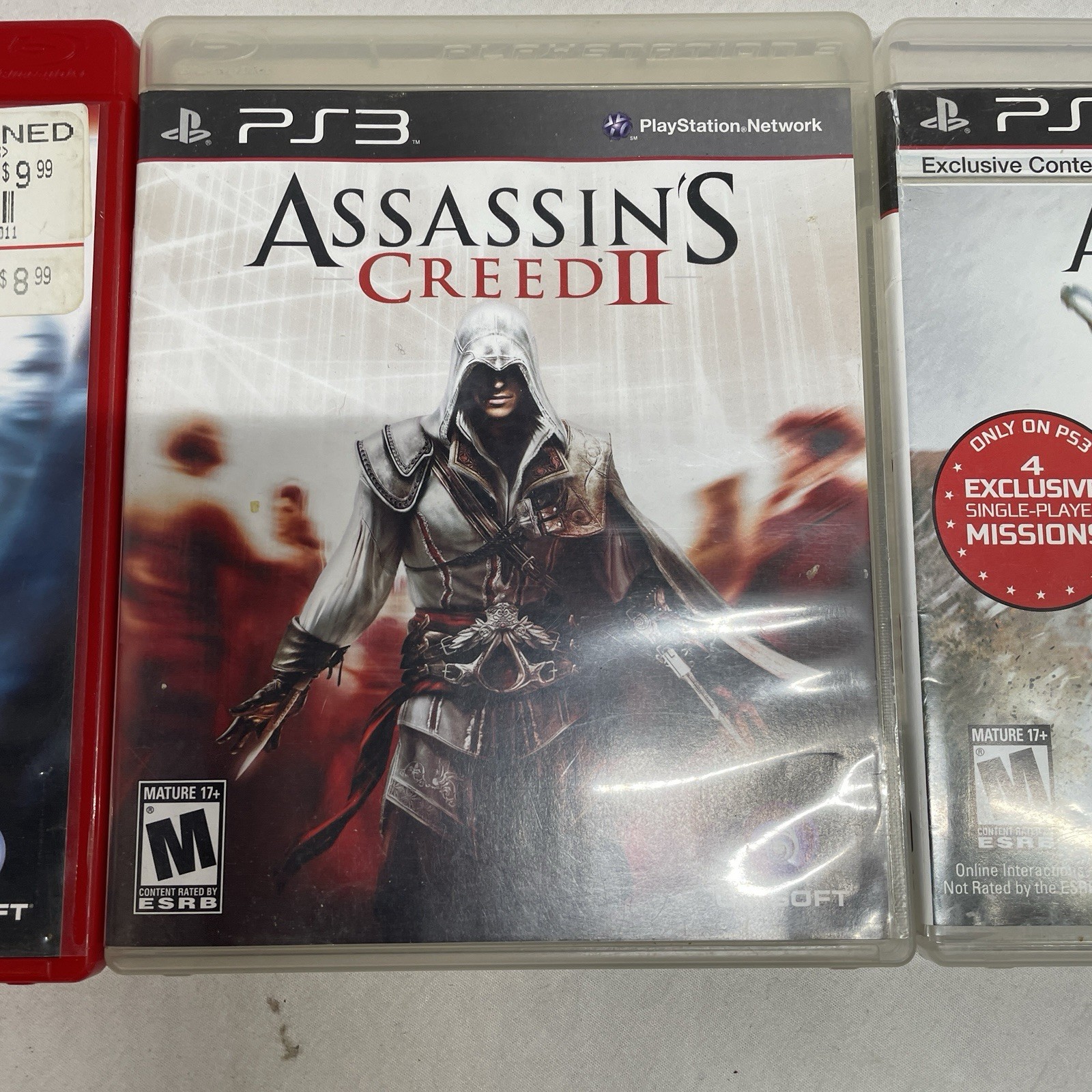 ASSASSIN’S CREED PS3 BUNDLE (ASSASSIN’S CREED 1-3) GAMES AND CASES